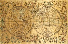 An early 19th Century silk needlework ‘Map of the World’ Hemispheres surrounded by an embroidered