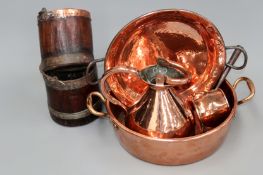 A Victorian copper two handled pan, a Victorian copper measure, copper handled shallow dish,