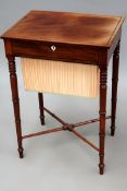 A Regency mahogany and ebony strung sewing table with rising top and silk lined work bag below.