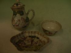 A Chinese export famille rose spoon tray, milk jug and cover and tea bowl decorated in the Adam