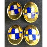 A pair of gentleman’s 9ct gold cufflinks. Bearing racing colours. Stamped Hancocks.