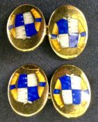 A pair of gentleman’s 9ct gold cufflinks. Bearing racing colours. Stamped Hancocks.