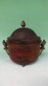 A Continental early 20th Century copper ice bucket. Dome cover, silvered bronze mounts and bird form