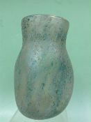 An unusual iridescent Art glass vase with pressed sides. 17cm high.