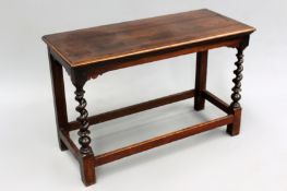 An 18th Century and later oak hall table on barley-twist turned forelegs and with peripheral