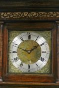 A Georgian and later oak country made tallcase clock. Brass dial with silvered chapter ring the