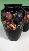 A pair of Moorcroft ovoid vases. 32cm high.