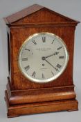 A mid 19th Century oak cased bracket clock with silvered circular dial signed “Barraud and Lunds