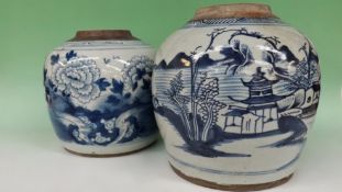 Two Chinese blue and white ginger jars. One with floral decoration, the other with a landscape.