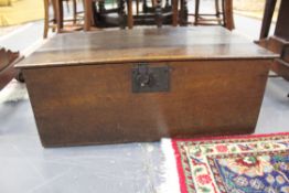 An unusual walnut and elm trunk with wrought iron lock and hinges.