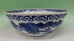 A Chinese blue and white deep bowl. Central interior with landscape scene. The exterior with