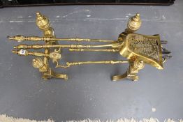 A set of Victorian brass fire tools. With fluted urn finial and matching andirons.