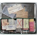 A small collection of BR and Foreign Tickets housed in a couple of early advertising tins.