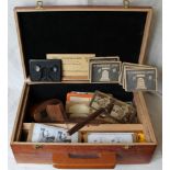 Wood cased Stereoscope with a quantity of old stereo photographs. Includes one of a Chinese pirate