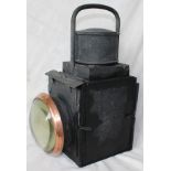 BR(M) Loco Lamp, black with copper bezel around the front bullseye lens. Complete with reservoir and