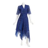 ANN WILSON STAGE WORN DRESS A sapphire blue chiffon wrap dress with scattered gold metallic stars