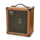 NANCY WILSON ROLAND CUBE-60 AMPLIFIER A Roland CUBE-60 amplifier in rust brown, serial number