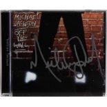 MICHAEL JACKSON SIGNED OFF THE WALL COMPACT DISC A compact disc copy of Michael Jackson's  Off   the