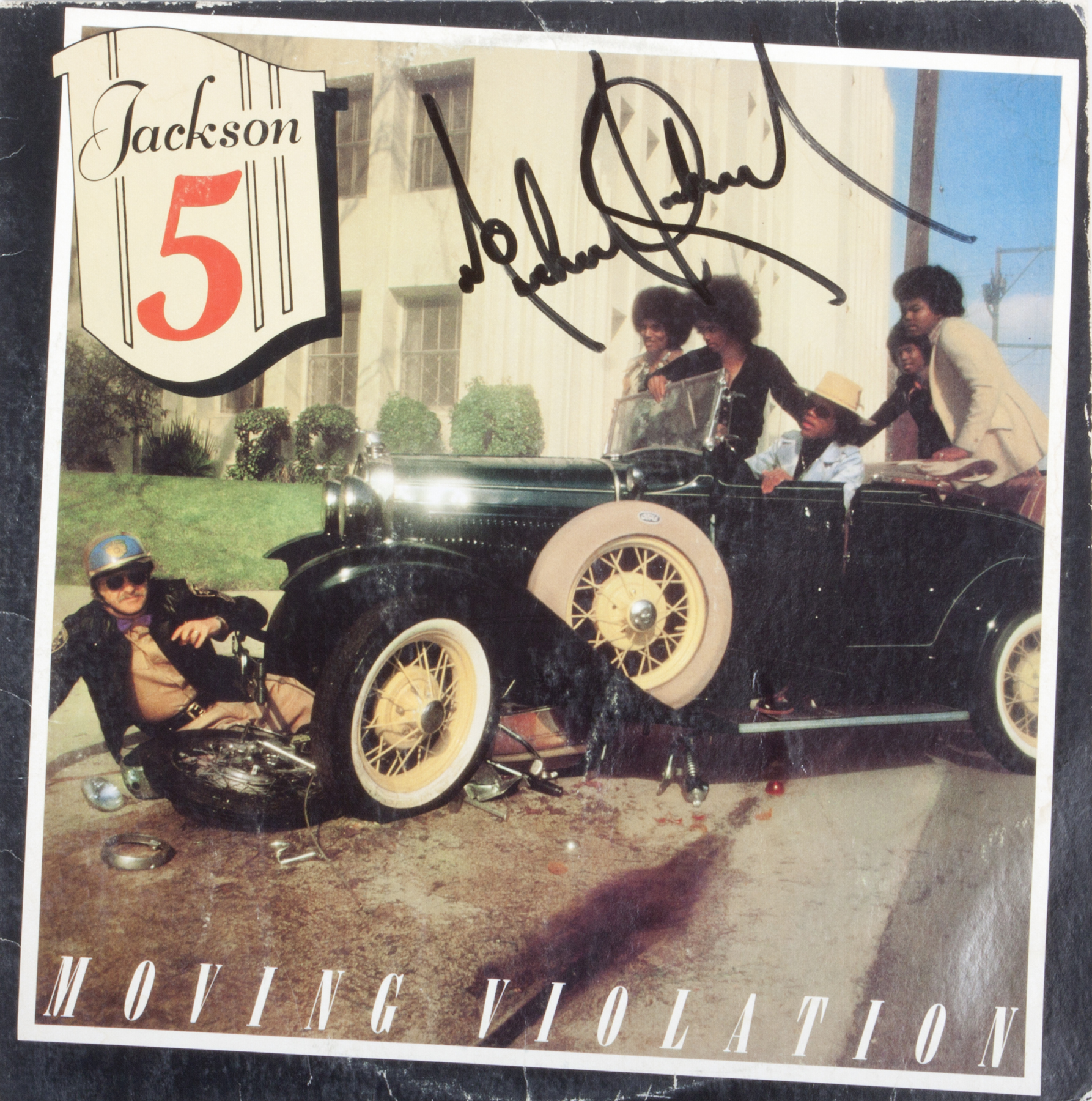 MICHAEL JACKSON SIGNED MOVING VIOLATION ALBUM A copy of the Jackson Five's  Moving   Violation  (