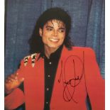 MICHAEL JACKSON SIGNED IMAGE An image of Michael Jackson signed in black ink.13 1/2 by 11 3/4