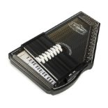 NANCY WILSON OSCAR SCHMIDT AUTOHARP A handcrafted Oscar Schmidt autoharp in black, model OS-73B,