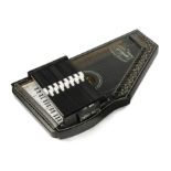 NANCY WILSON OSCAR SCHMIDT AUTOHARP A handcrafted Oscar Schmidt autoharp in black, model OS-73B,