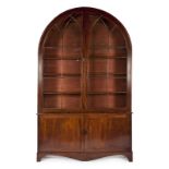 GOTHIC REVIVAL BOOKCASE A Victorian mahogany Gothic Revival bookcase with glazed doors over