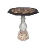 MARBLE SPECIMEN TABLE A modern marble specimen table with an octagonal-shaped top and a marble