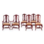 CONTEMPORARY WILLIAM AND MARY DINING CHAIRS A set of 12 carved dining chairs with red flocking and