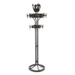 MEDIEVAL STYLE HALL COAT RACK A circular iron coat rack with a crown finial.Height, 81 inches