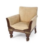 ANTIQUE CLUB CHAIR An antique parcel gilt stencil decorated mahogany club chair on casters, with