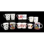 ASSORTED GROUP OF COFFEE MUGS An assorted group of 12 coffee or tea cups featuring a variety of