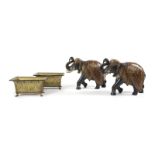 PAIR OF PAINTED ELEPHANTS A pair of carved wooden painted elephants, together with a pair of gilt