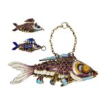 BARBARA BACH ARTICULATED ENAMEL FISH CHARMS Two small and one large silver filigree and enamel