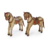 PAIR OF DECORATIVE WOODEN HORSES Two Assyrian style painted wooden horses.25 by 26 by 7 inches