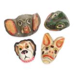 GROUP OF FOUR ANIMAL MASKS Painted papier mâché animal masks.Largest, 10 by 13 inches