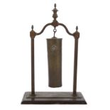 ASIAN BRONZE GONG ON STAND An antique Asian gong on a stand.22 1/2 by 15 by 7 1/2 inches