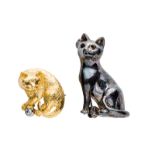BARBARA BACH TWO CAT PINS The first in 18k yellow gold marked "Tiffany," the second is plated base