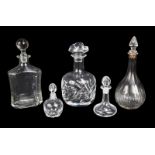 GROUP OF FIVE DECANTERS INCLUDING LALIQUE An assorted group of crystal decanters, including a