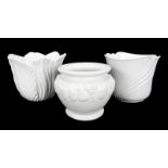 GROUP OF SEVEN WHITE PAINTED POTS Three large ceramic white jardinieres, together with a large white