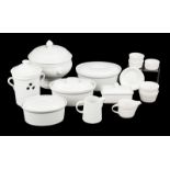 WHITE POTTERY SERVEWARE A group of assorted white pottery serveware, including a round lidded