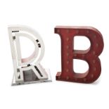 ELECTRIFIED "R" AND "B" SIGNS A large red painted metal "R" and "B," each electrified to light