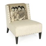 UPHOLSTERED SGT. PEPPER'S CHAIR A modern upholstered chair with a tapestry depiction of the