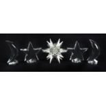 CRYSTAL MOON AND STARS A collection of two Baccarat moons and two Baccarat stars, together with