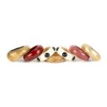 JOAN COLLINS LARGE BANGLE BRACELETS A collection of seven large bangle bracelets owned by Joan