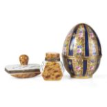 JOAN COLLINS THREE MODERN LIMOGES ITEMS Including a parcel gilt painted egg and a set of two desktop