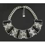 JOAN COLLINS WORN NEWBRIDGE SILVERWARE NECKLACE A silver tone necklace with clear and black glass