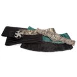 JOAN COLLINS EVENING BELTS A collection of seven evening belts owned by Joan Collins. The group
