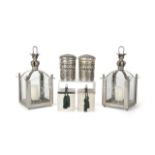 JOAN COLLINS GROUP OF SIX CANDLE HOLDERS Three pairs of metal and/or glass candle holders, some