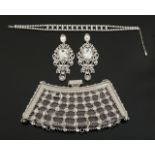 JOAN COLLINS NOLAN MILLER JEWELRY AND EVENING BAG A group of Nolan Miller accessories embellished